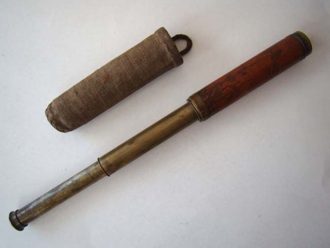 A rare Mariners' two-draw pocket telescope by George Linnell of London circa 1780-1800 along with its' original sailor-made canvas carrying case.